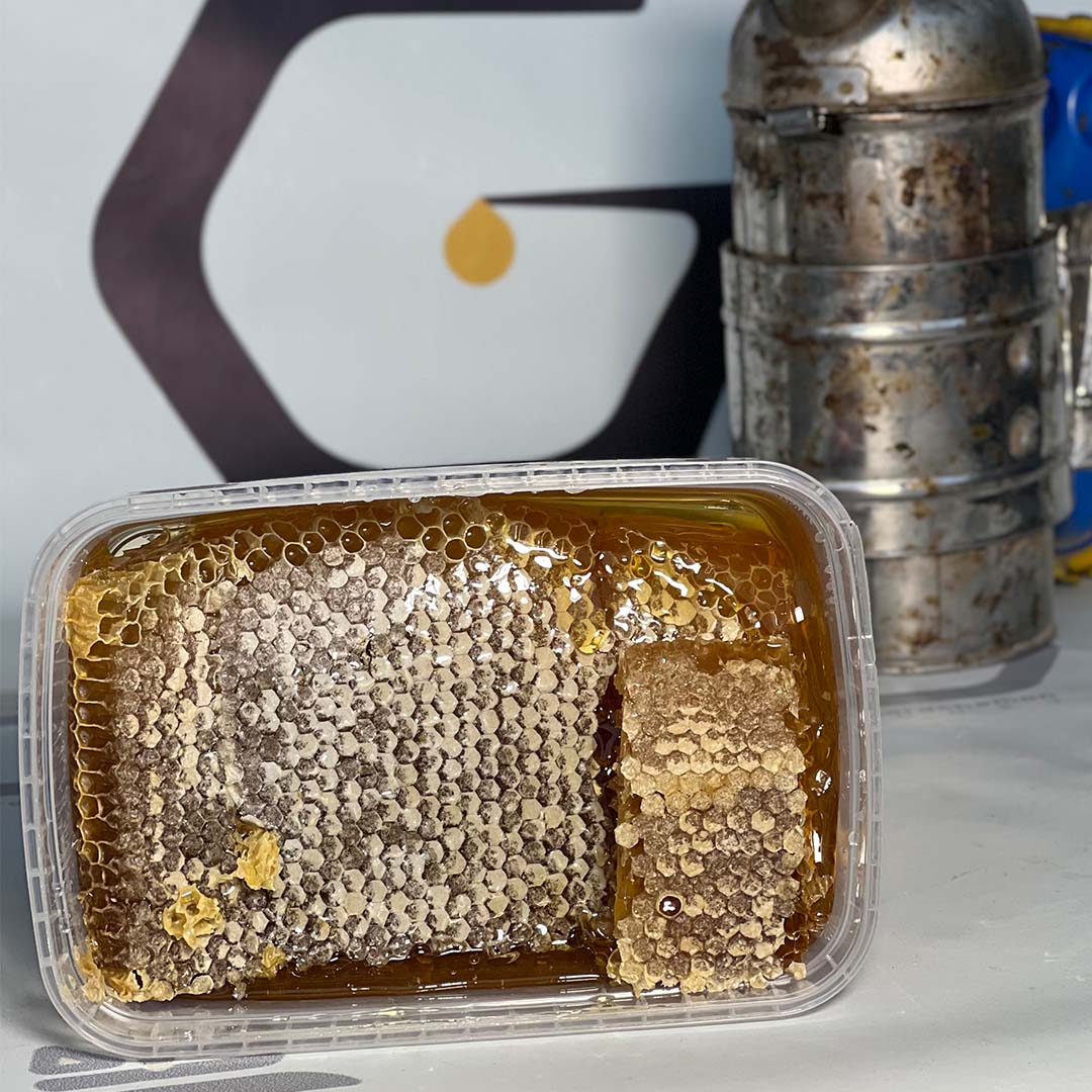 عسل طبيعي بشمعه ١ كيلوغرام - الصورة 2